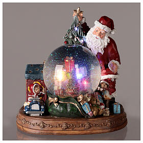 Christmas snow globe Santa and gifts battery powered 30x25x30 cm