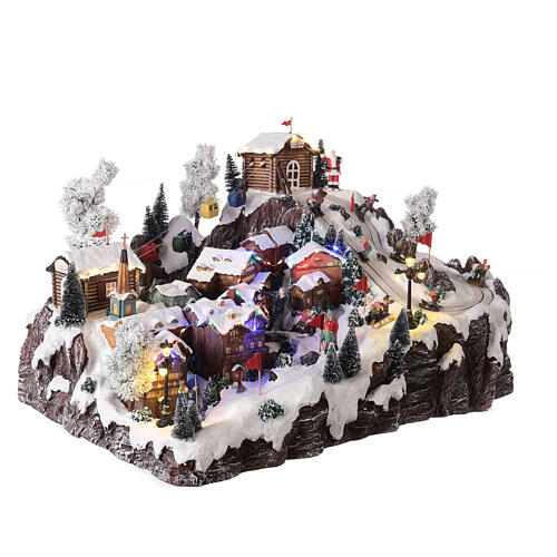 Christmas village set with ropeway, ski slope and skaters, music and lights, 40x60x50 cm 5