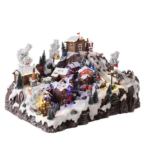 Christmas village set with ropeway, ski slope and skaters, music and lights, 40x60x50 cm 9