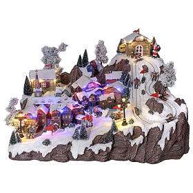 Pueblo Navidad teleférico pista de esquí patinadores música luces 40x60x50 cm