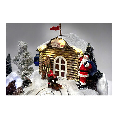 Pueblo Navidad teleférico pista de esquí patinadores música luces 40x60x50 cm 5