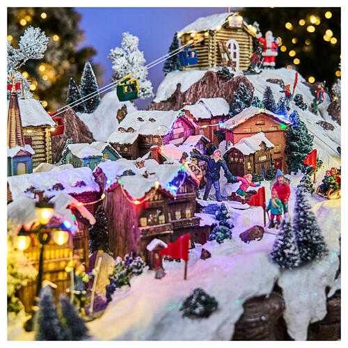 Pueblo Navidad teleférico pista de esquí patinadores música luces 40x60x50 cm 3
