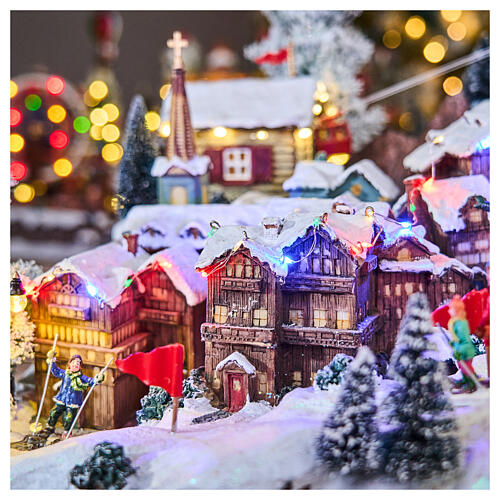 Pueblo Navidad teleférico pista de esquí patinadores música luces 40x60x50 cm 9
