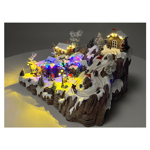 Villaggio Natale funivia pista da sci pattinatori musica luci 40x60x50 cm 8