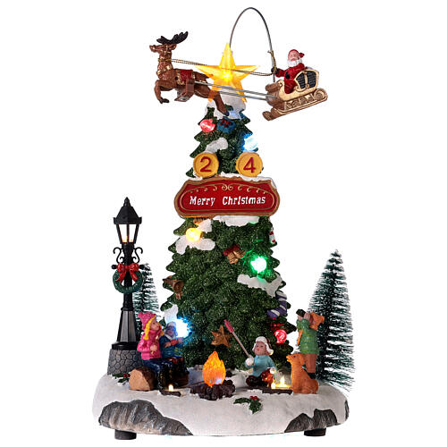 Christmas village set with firecamp and Santa in motion 12x8x7 in 1