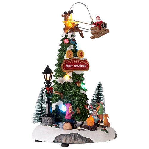 Christmas village set with firecamp and Santa in motion 12x8x7 in 5