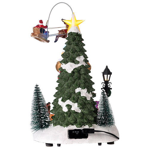Cenário natalino: fogueira, árvore de Natal e Pai Natal em movimento 30x20x20 cm 6
