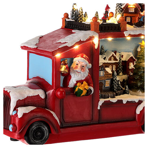 Camion de Père Noël lumières et mouvement 20x30x10 cm 4