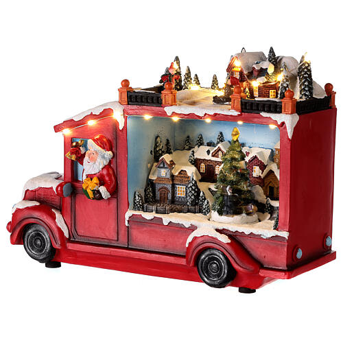 Camion de Père Noël lumières et mouvement 20x30x10 cm 6