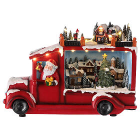 Ciężarówka ze Świętym Mikołajem, oświetlenie i ruch, 20x30x10 cm