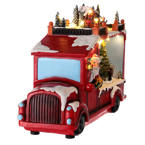 Ciężarówka ze Świętym Mikołajem, oświetlenie i ruch, 20x30x10 cm 8
