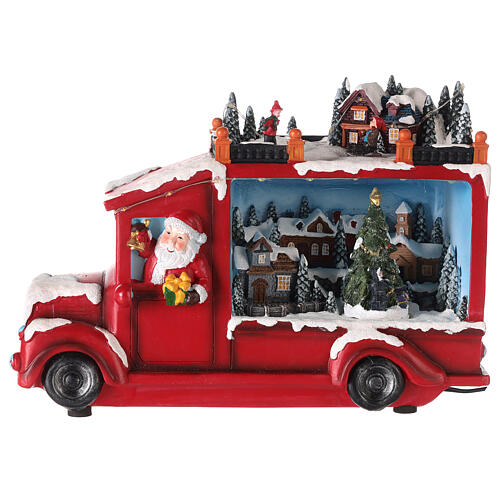 Ciężarówka ze Świętym Mikołajem, oświetlenie i ruch, 20x30x10 cm 9