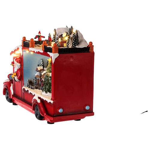 Ciężarówka ze Świętym Mikołajem, oświetlenie i ruch, 20x30x10 cm 10
