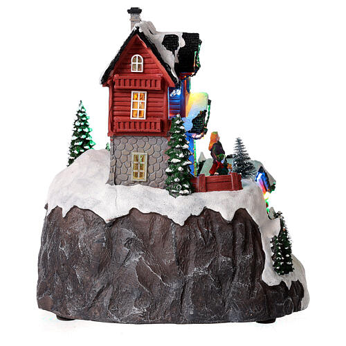 Christmas village set with skiers in motion and lights 10x10x8 in 7