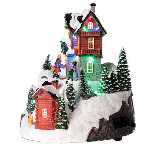 Christmas village set with skiers in motion and lights 10x10x8 in 8