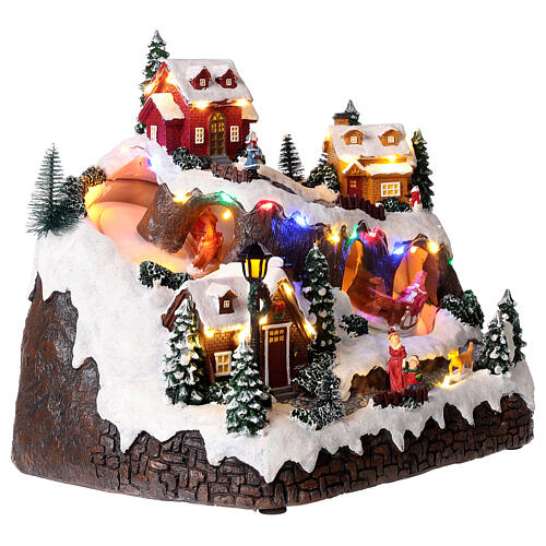 Village de Noël avec piste pour traineaux 30x30x20 cm 6