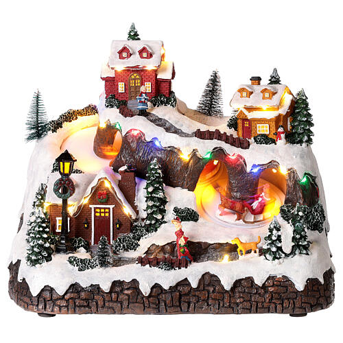 Christmas scene with Santa Claus on sled, 30x30x20 cm 1