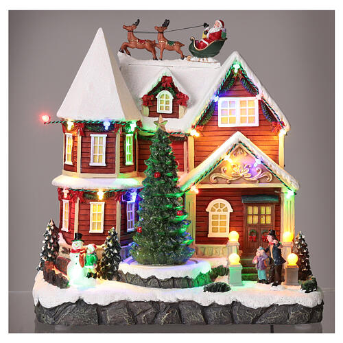 Christmas village set: house with Santa above it 10x10x8 in 2