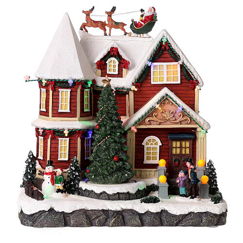 Christmas village set: house with Santa above it 10x10x8 in 6