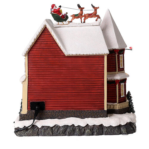 Christmas village set: house with Santa above it 10x10x8 in 7