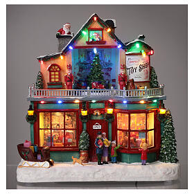 Christmas village set: toy shop 12x12x8 in