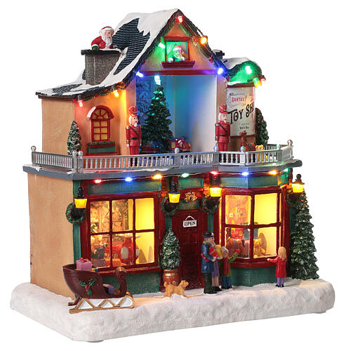 Christmas village set: toy shop 12x12x8 in 6