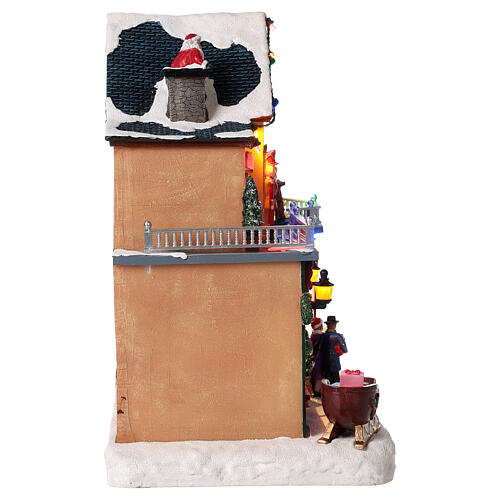 Christmas village set: toy shop 12x12x8 in 7