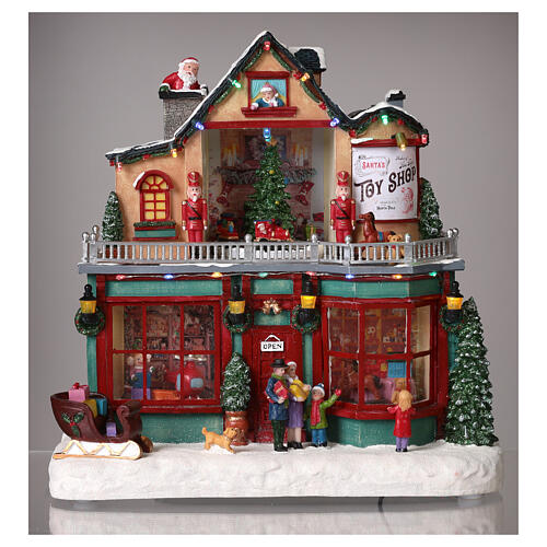 Christmas village set: toy shop 12x12x8 in 9