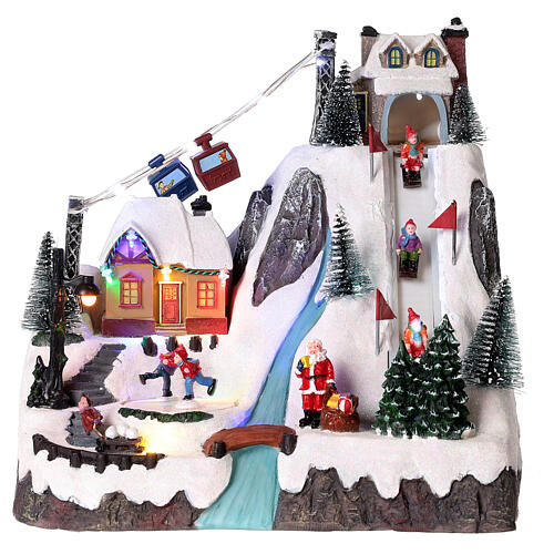 Christmas village set: sledders and skaters 12x12x8 in 1