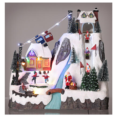 Christmas village animated skaters and sledders 30x30x20 cm 2