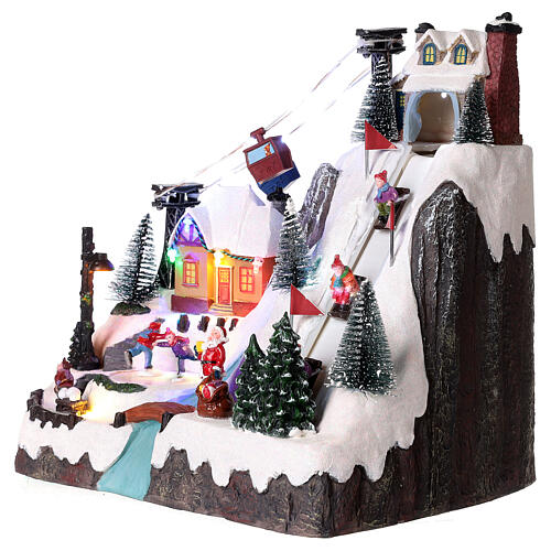 Christmas village animated skaters and sledders 30x30x20 cm 3