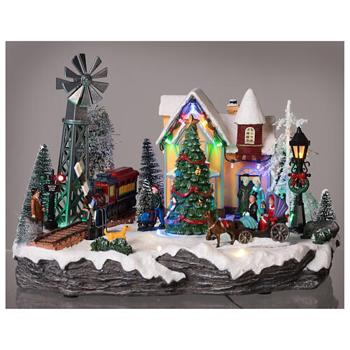 Christmas village set with train and Christmas tree in motion 8x10x14 in 2