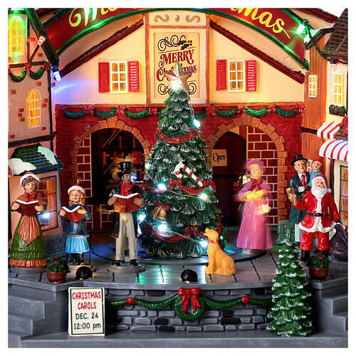 Christmas village set with an animated choir 10x14x8 in 3