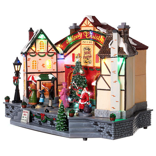 Christmas village set with an animated choir 10x14x8 in 4