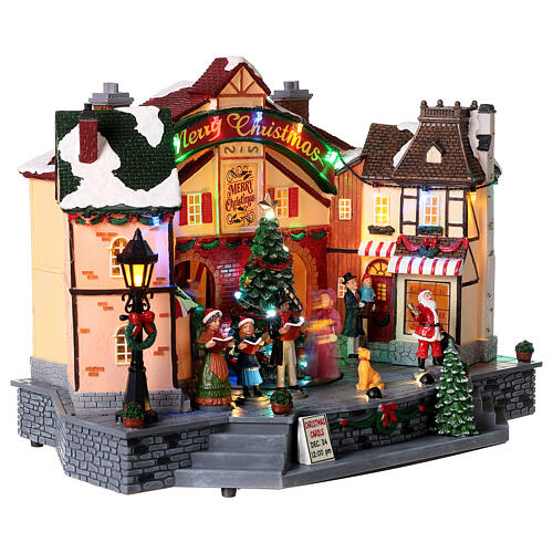 Christmas village set with an animated choir 10x14x8 in 5