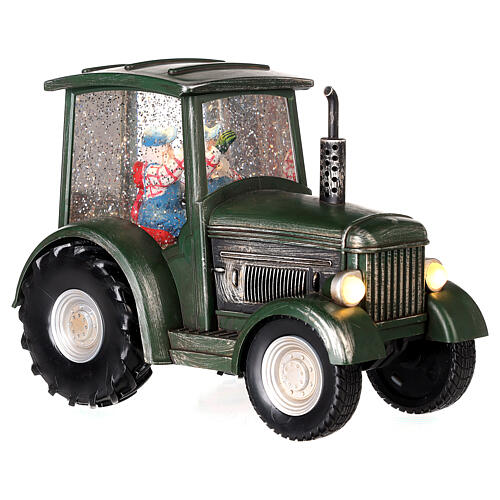 Santa's tractor, snow globe, 8x8x4 in 6