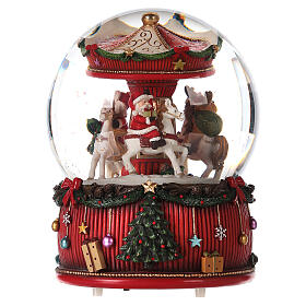 Snow globe with merry-go-round 10x6x6 in