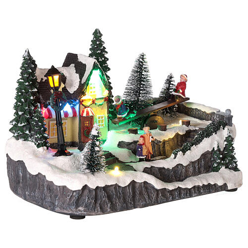 Christmas village set with animated swing 6x8x6 in 5