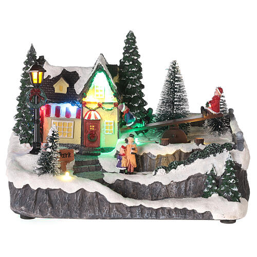 Village de Noël avec balançoire en mouvement 15x20x15 cm 4