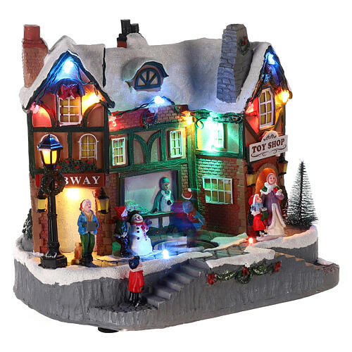 Christmas village set: building and skaters in motion 8x10x6 in 4