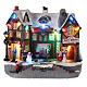 Christmas village set: building and skaters in motion 8x10x6 in s1