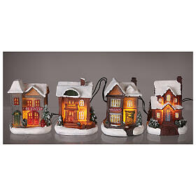 Figurines and houses with LED lights for Christmas villages, set of 15 pieces