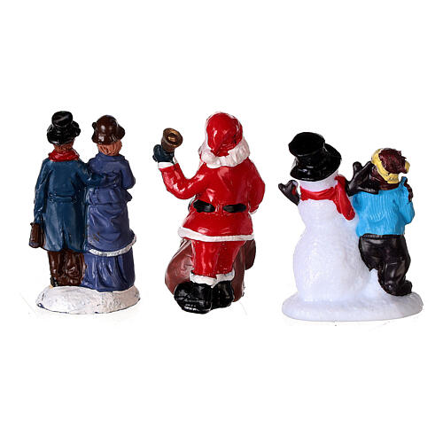 Figurines and houses with LED lights for Christmas villages, set of 15 pieces 9