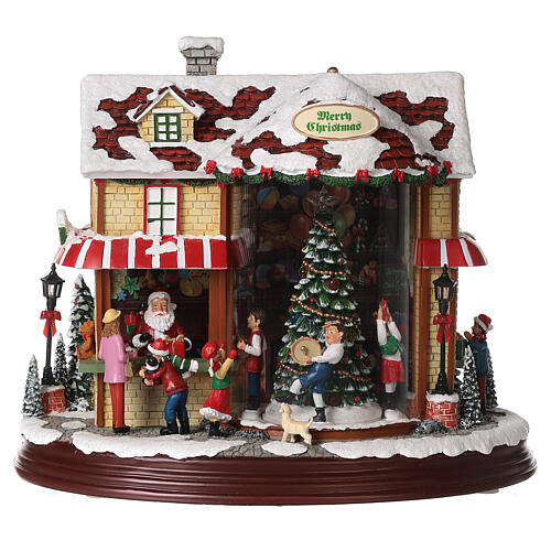 Christmas village set: Santa's shop with Christmas tree in motion 10x12x6 in 1