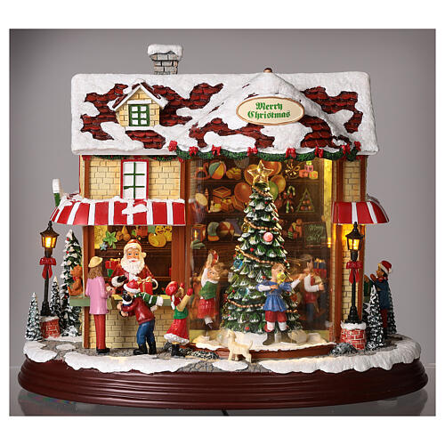 Christmas village set: Santa's shop with Christmas tree in motion 10x12x6 in 3