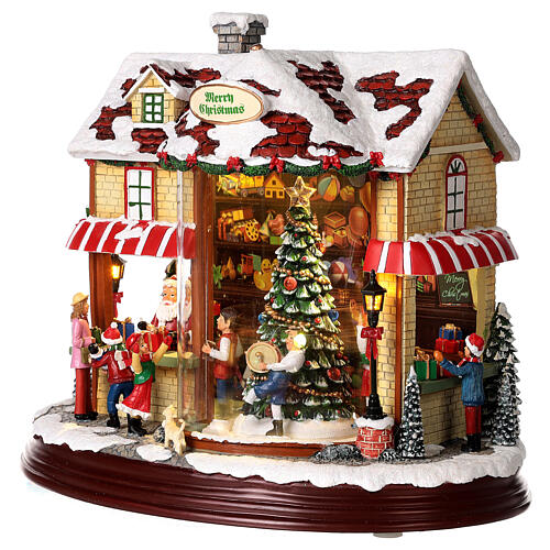 Christmas village set: Santa's shop with Christmas tree in motion 10x12x6 in 5