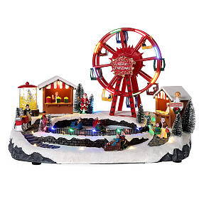 Christmas village set: big wheel and sleds in motion 12x16x10 in