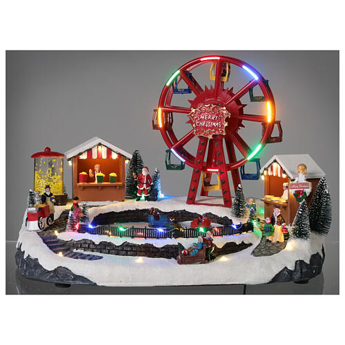 Christmas village set: big wheel and sleds in motion 12x16x10 in 2