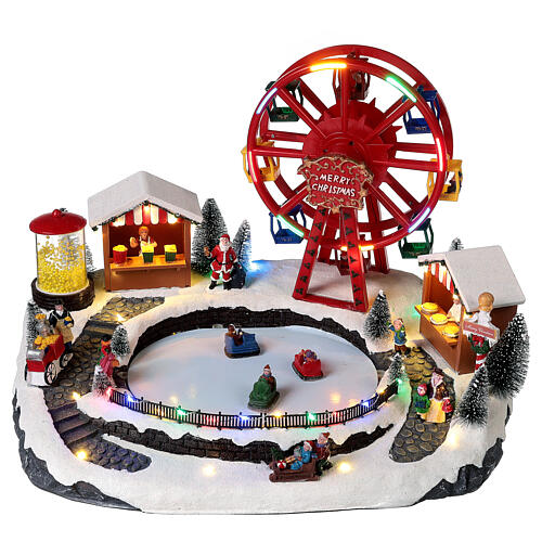 Christmas village set: big wheel and sleds in motion 12x16x10 in 3