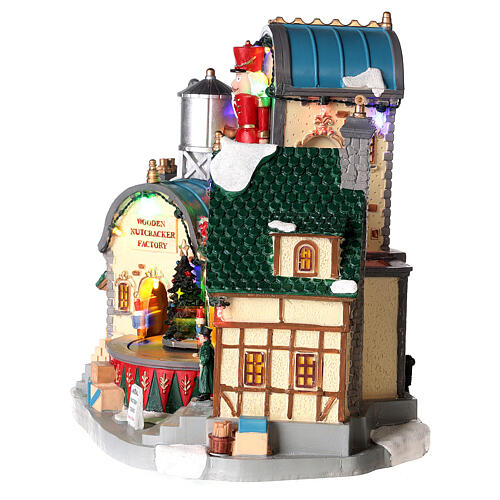 Christmas village set: wooden nutcracker factory with lights and animations, 12x12x8 in 9